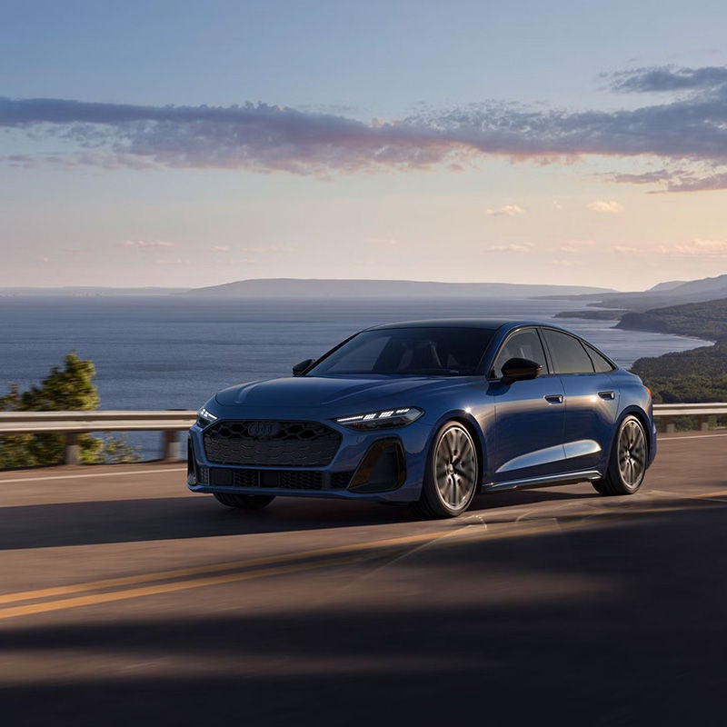 an 2025 Audi S5 left profile driving.