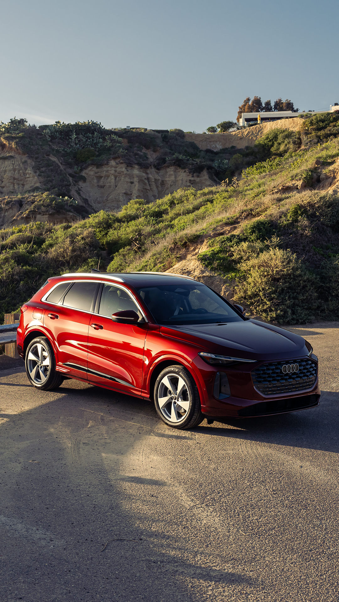 Audi 2025 Audi Q6 e-tron left profile driving.