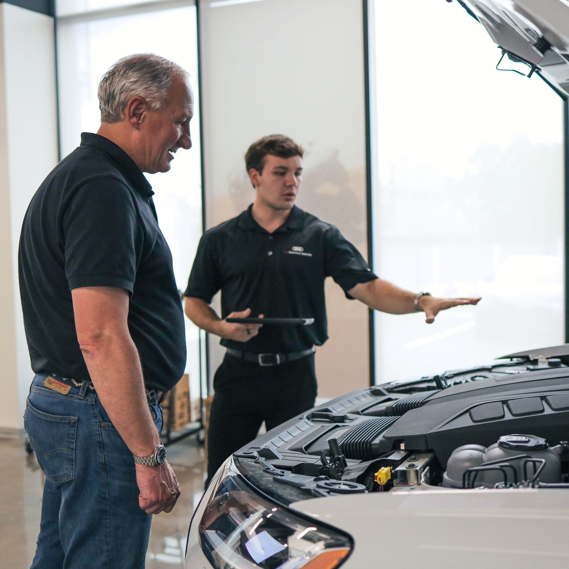 Rear profile view of an Audi Q5 parked.