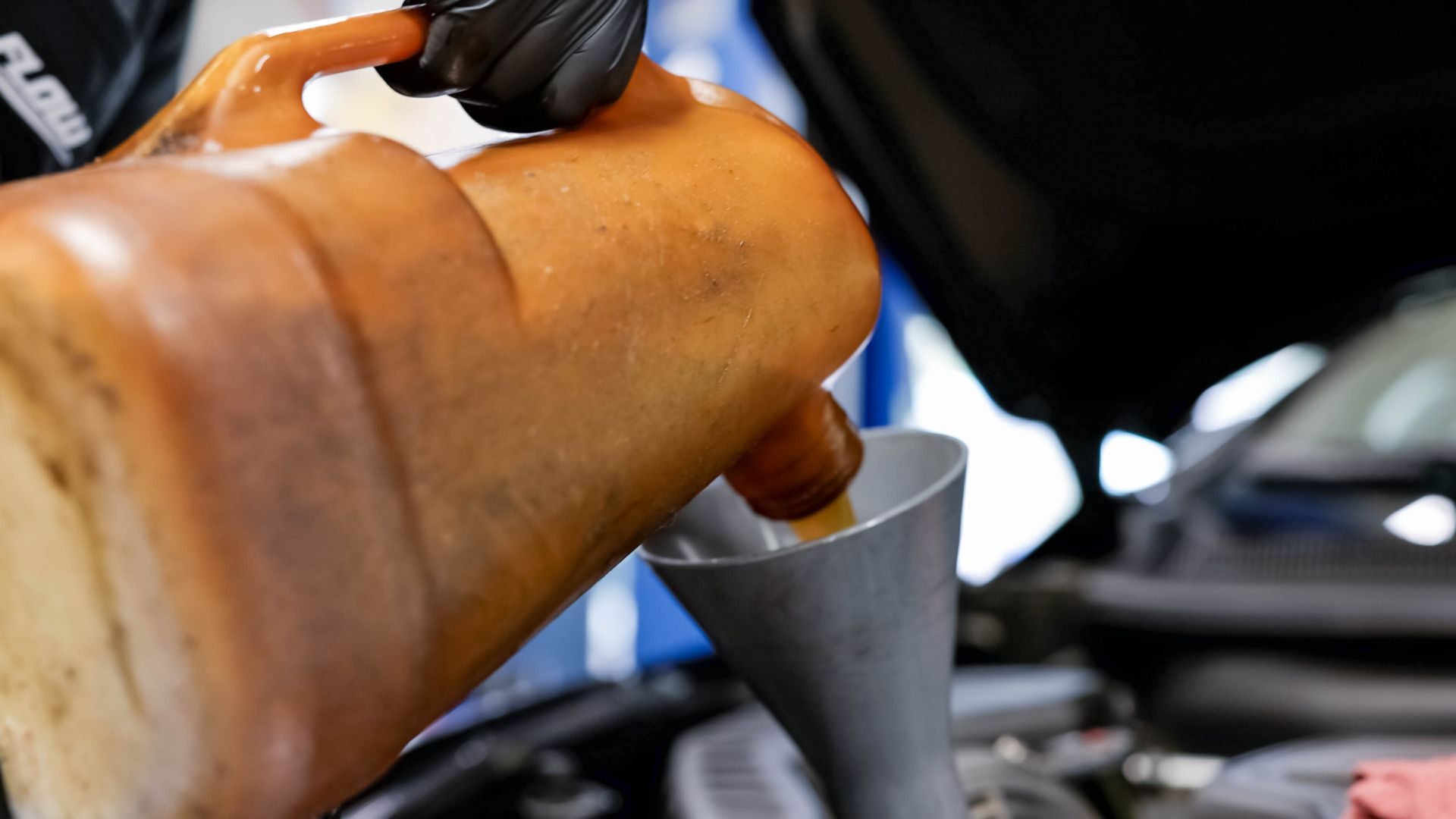 Interior view of an Audi steering wheel and dashboard.