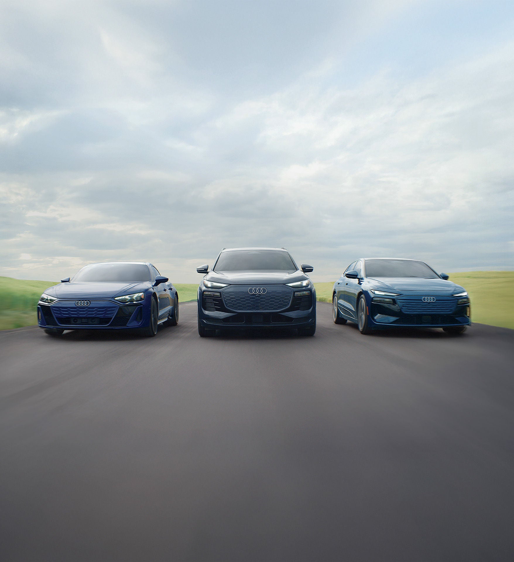 Audi 2025 Audi S e-tron GT left profile driving.