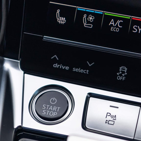 Close-up of the drive select button in the Audi e-tron. 