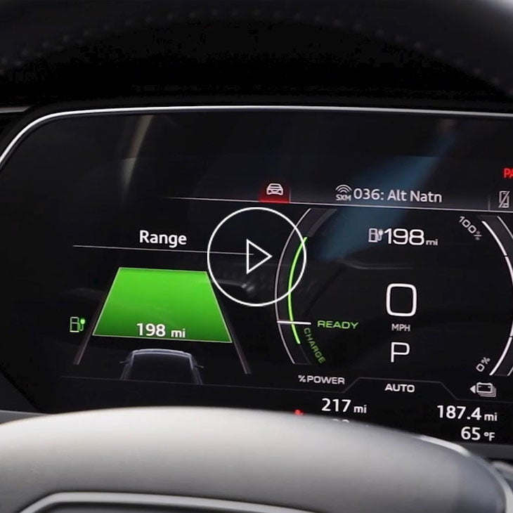  Close-up on the range gauge in an Audi vehicle.