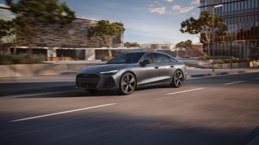 Three-quarter view of the Audi A6 Sedan in motion.