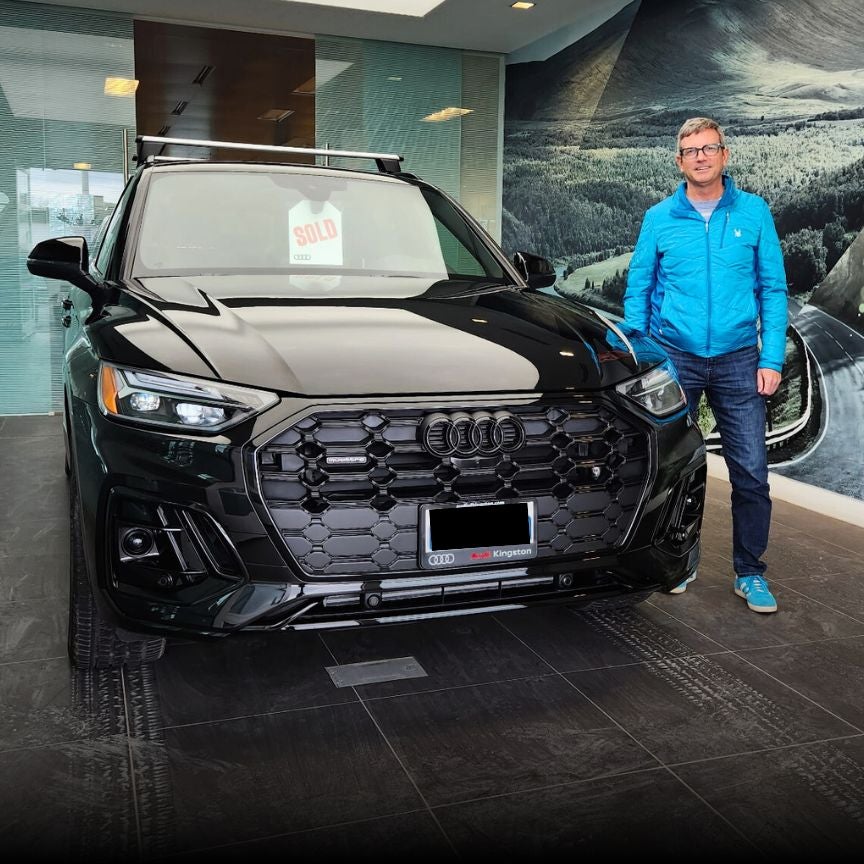 Customer picking up their new Audi