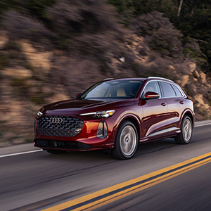Side view of an Audi Q5 Driving.