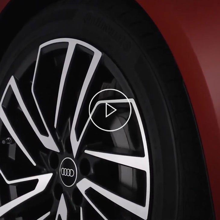 Close up on the tire of an Audi vehicle.