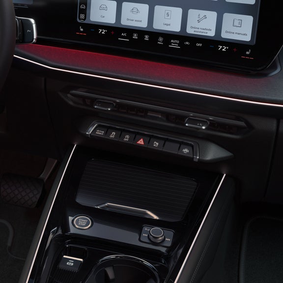 Gros plan du bouton de sélection de conduite Audi sur l'Audi Q3.