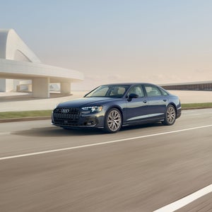 3/4 side view of the Audi A8 in motion.