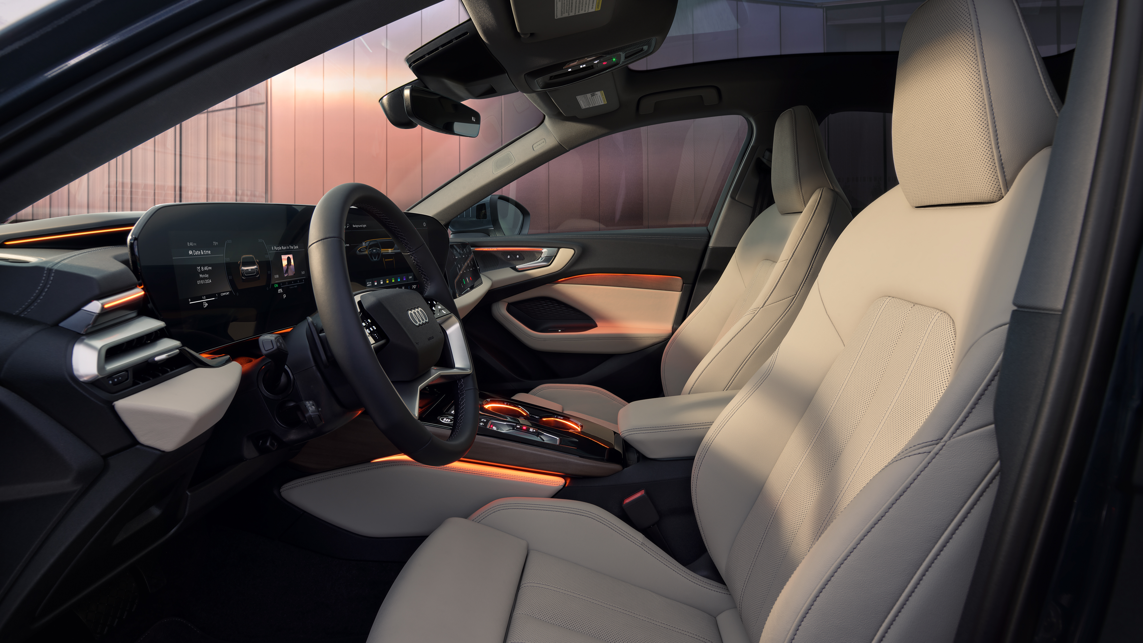 Inside of an Audi a5 with beige front seats.