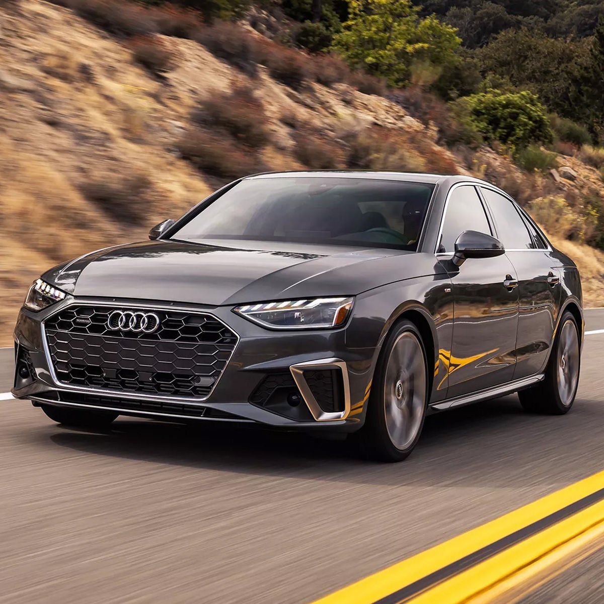 Three quarter front view of the Audi Q5 accelerating. 
