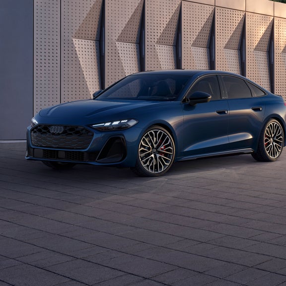 Three-quarter front view of the Audi S5 parked.