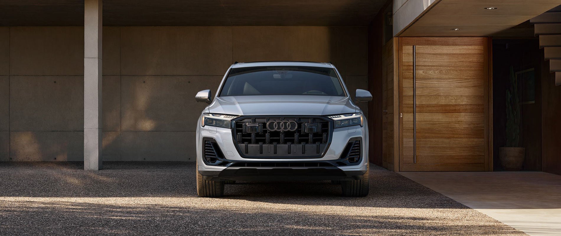 Front-view of the 2025 Audi Q7 parked in a driveway