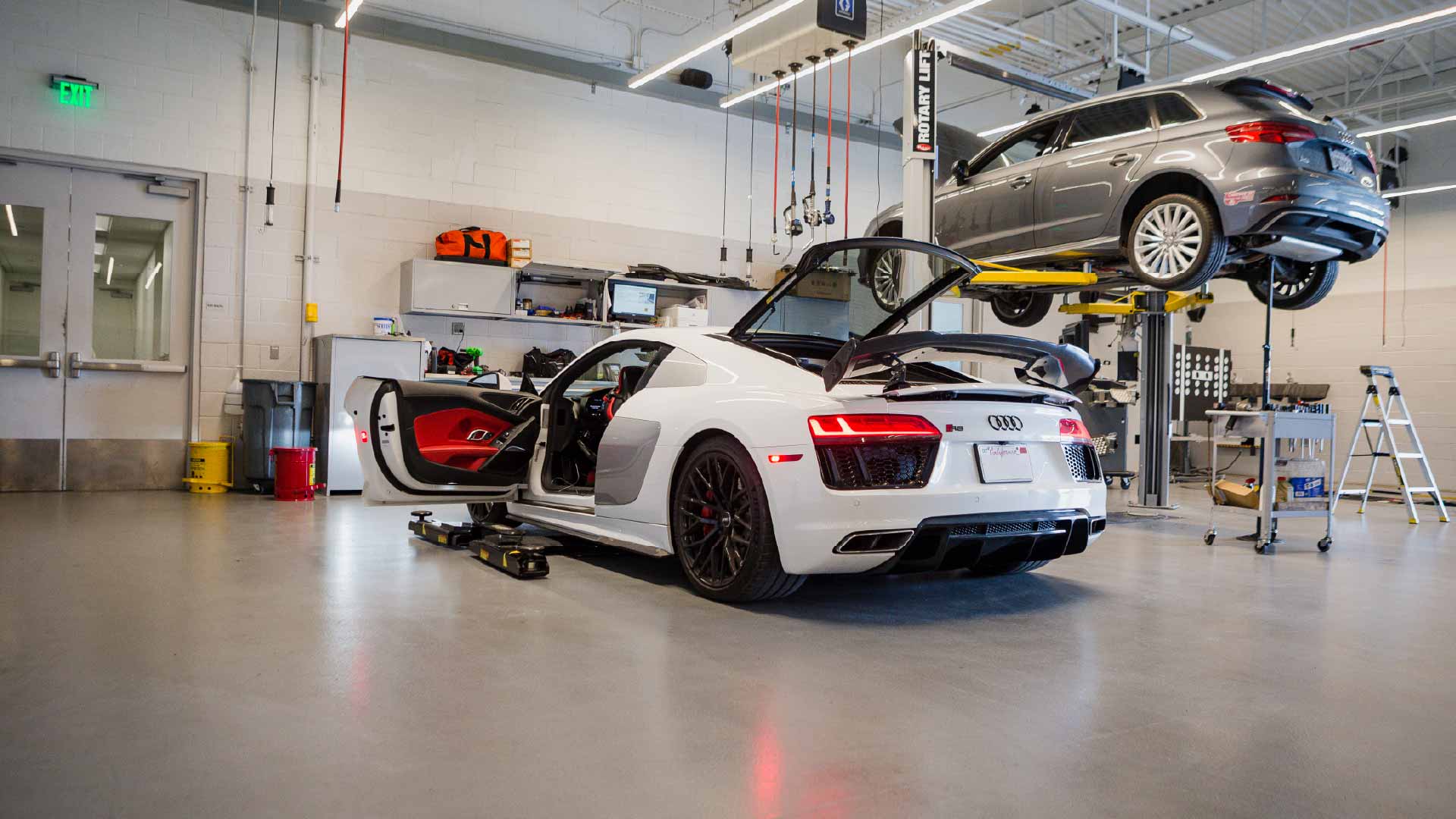 Image of Audi vehicle being serviced.