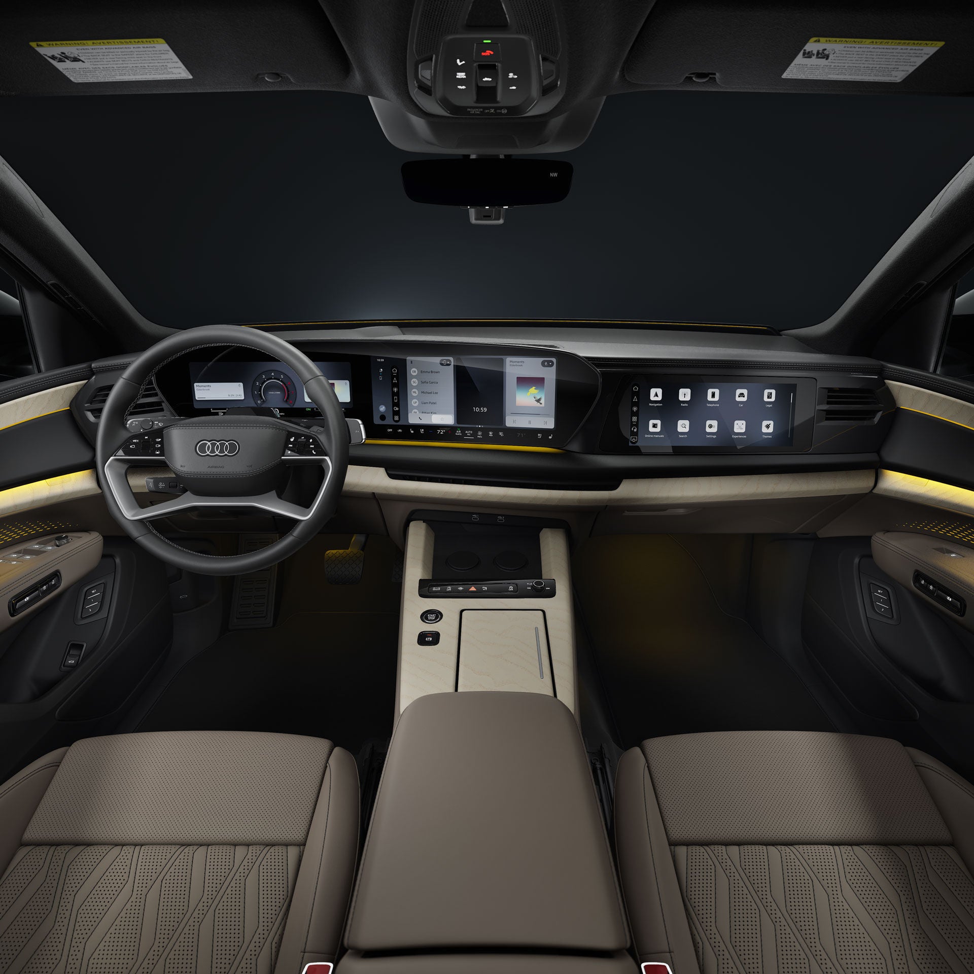 View from the back seat into the cockpit of the Audi Q9 SUV. In the foreground are the steering wheel and the panoramic displays featuring the Audi Virtual Cockpit and the MMI display.