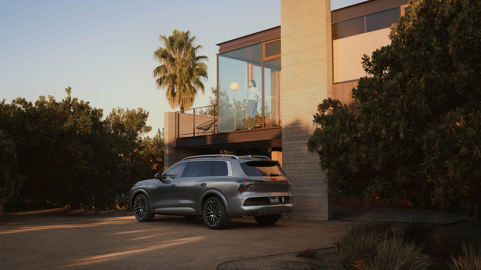Rear profile view of an Audi SQ9 parked.