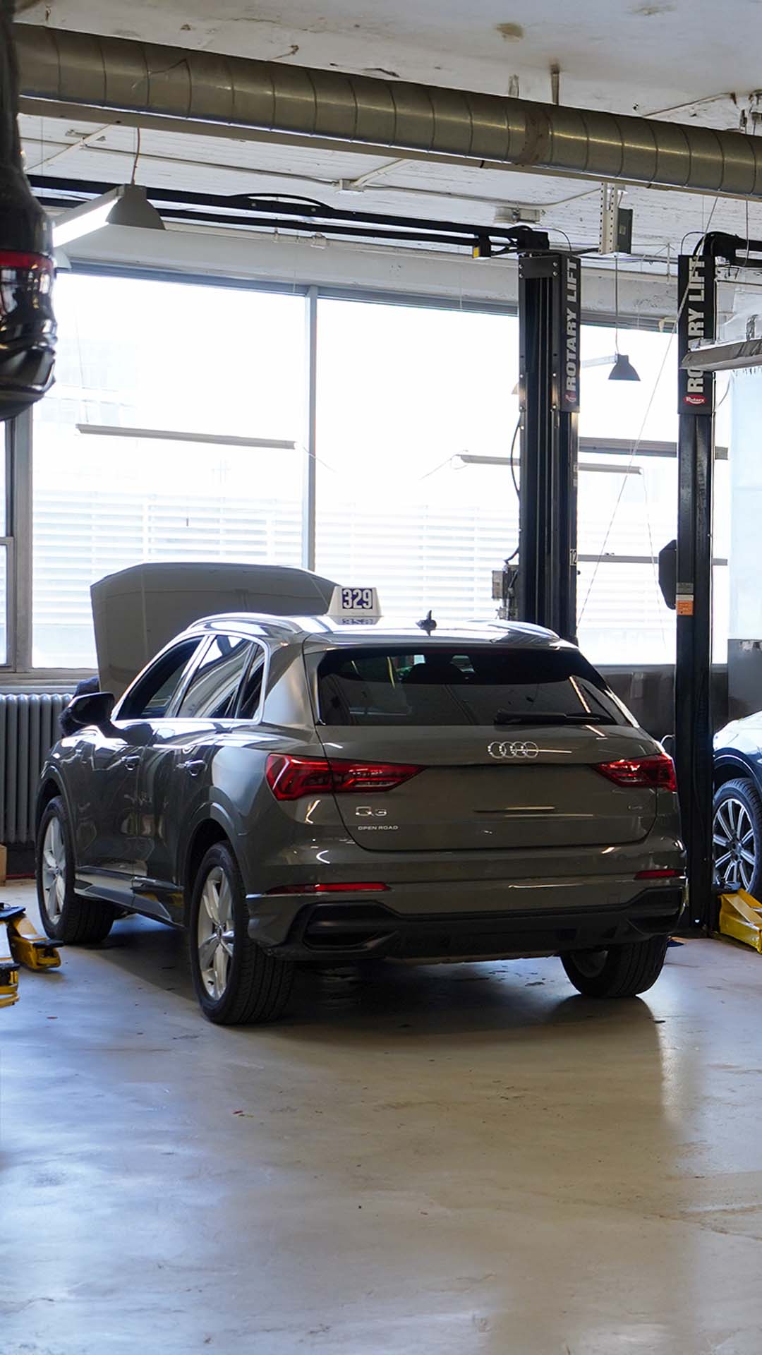 View of an Audi vehicle being serviced.