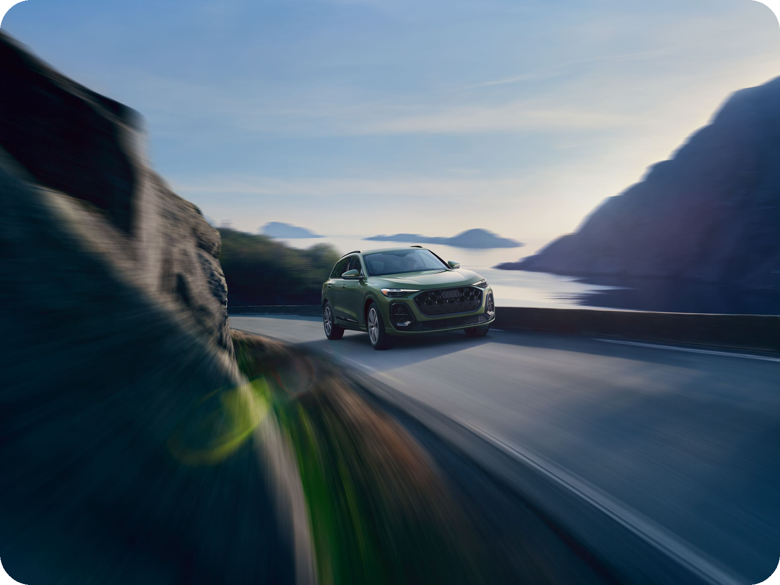 2026 Audi Q5 in motion — midsize luxury SUV.