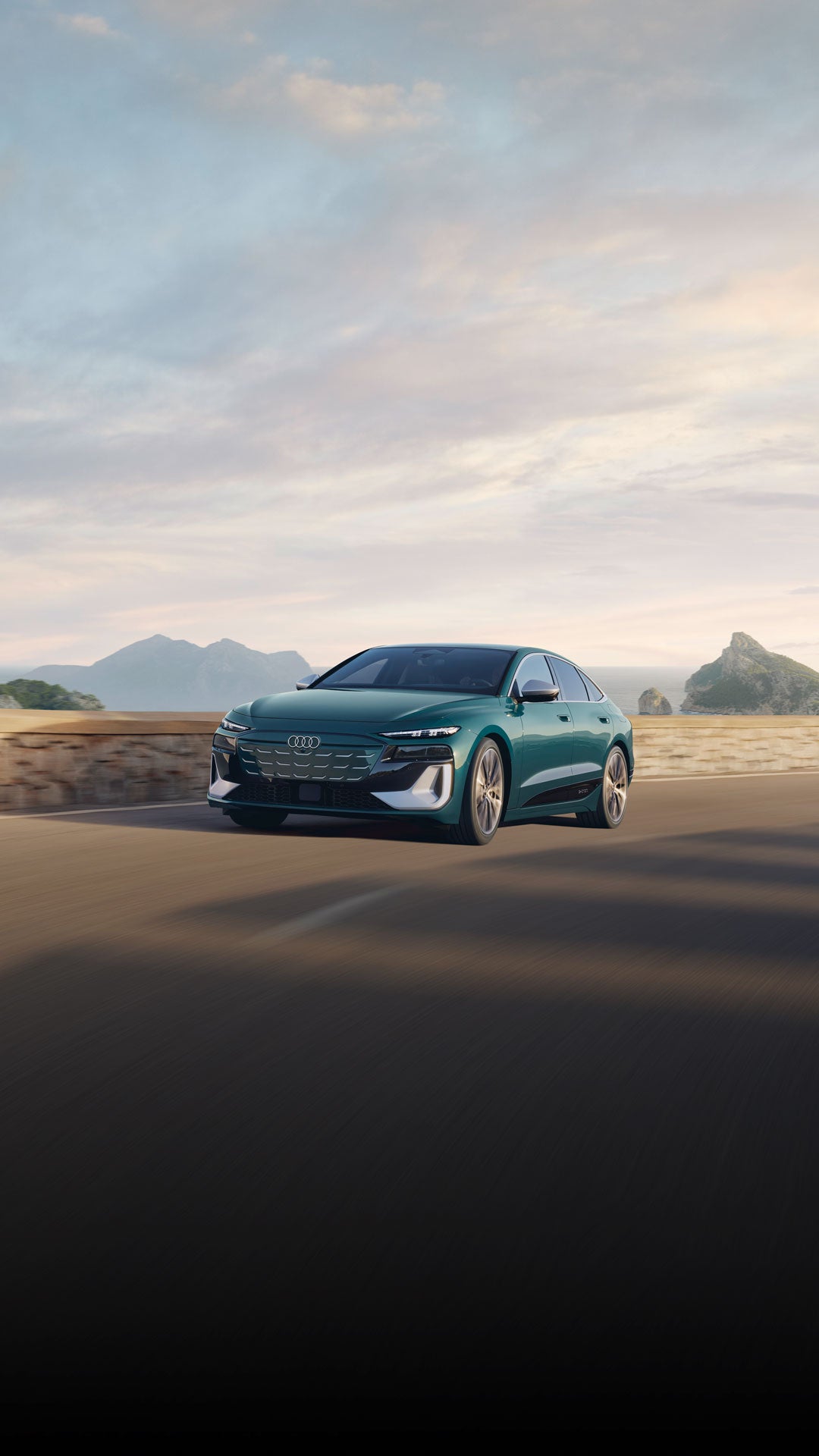 Three-quarter front view of the Audi S6 e-tron in motion.