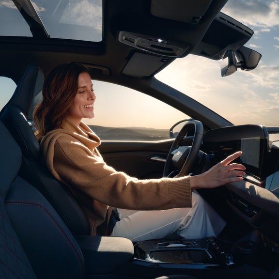 Audi customer sitting in their car purchased via Audi Financial Services.