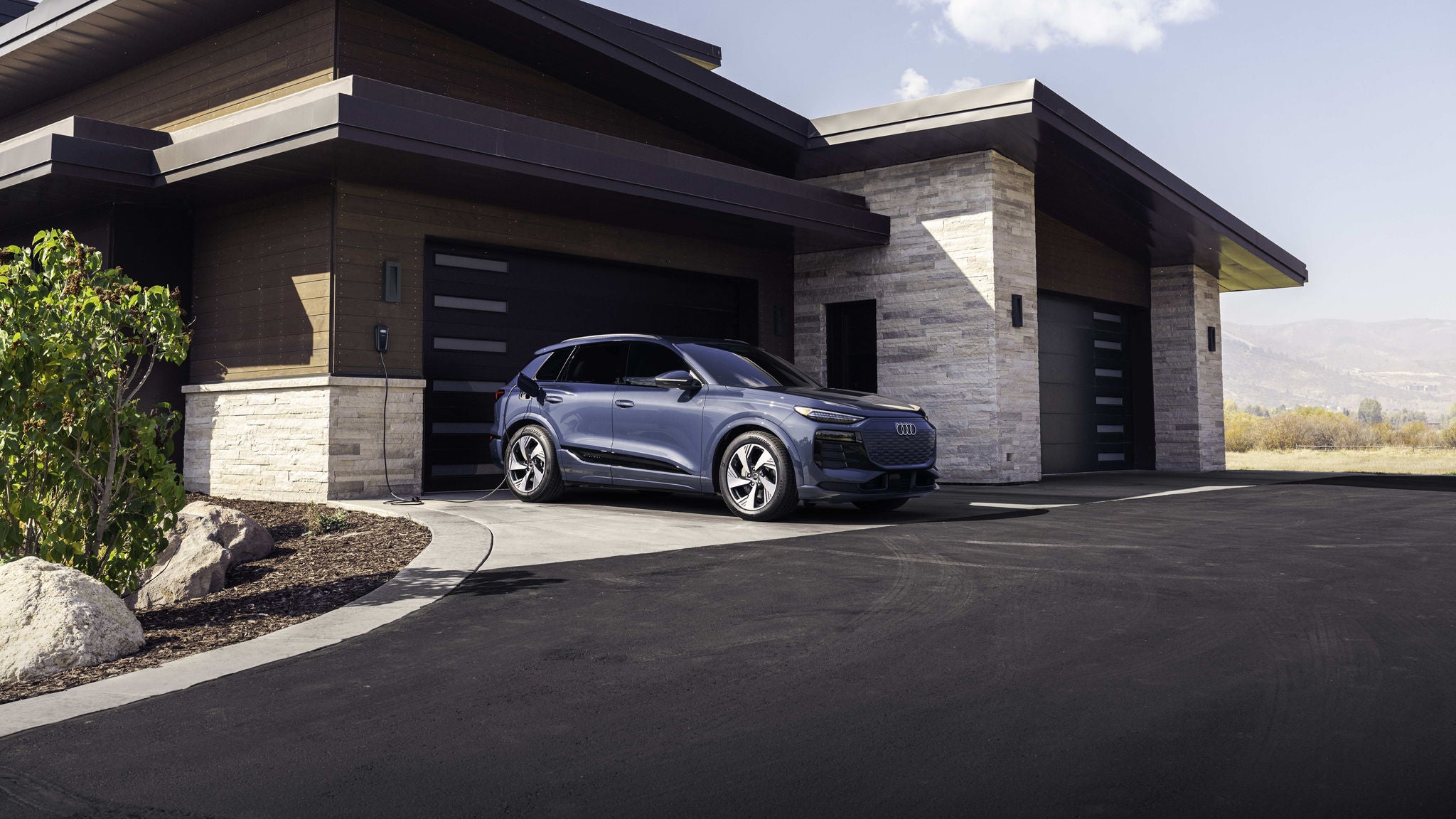 Right side profile of an Audi Q8 e-tron parked.
