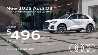 Side view of an Audi Q3 parked.