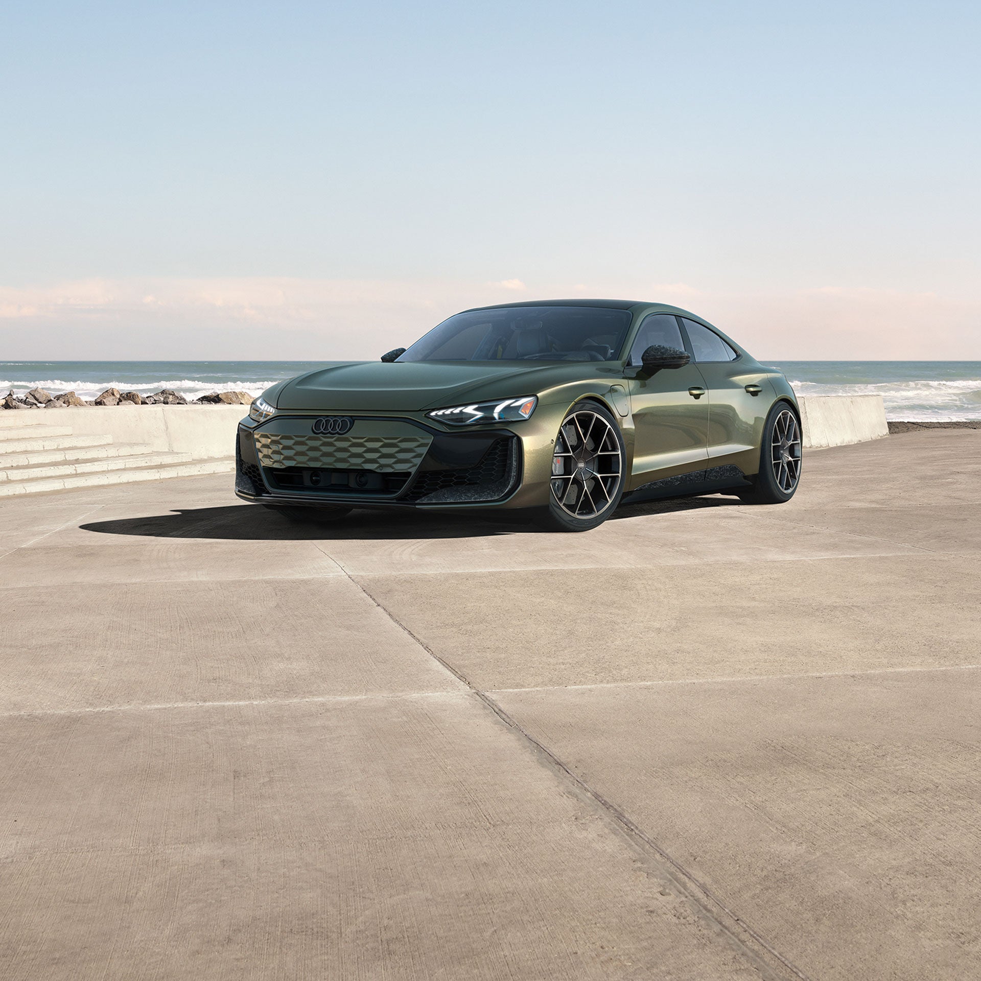 Three-quarter front view of the Audi RS e-tron GT parked.
