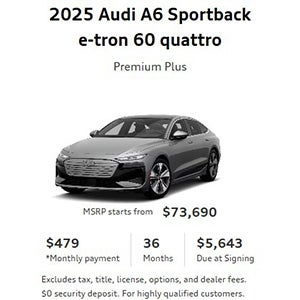 Side view of an Audi A6 driving.