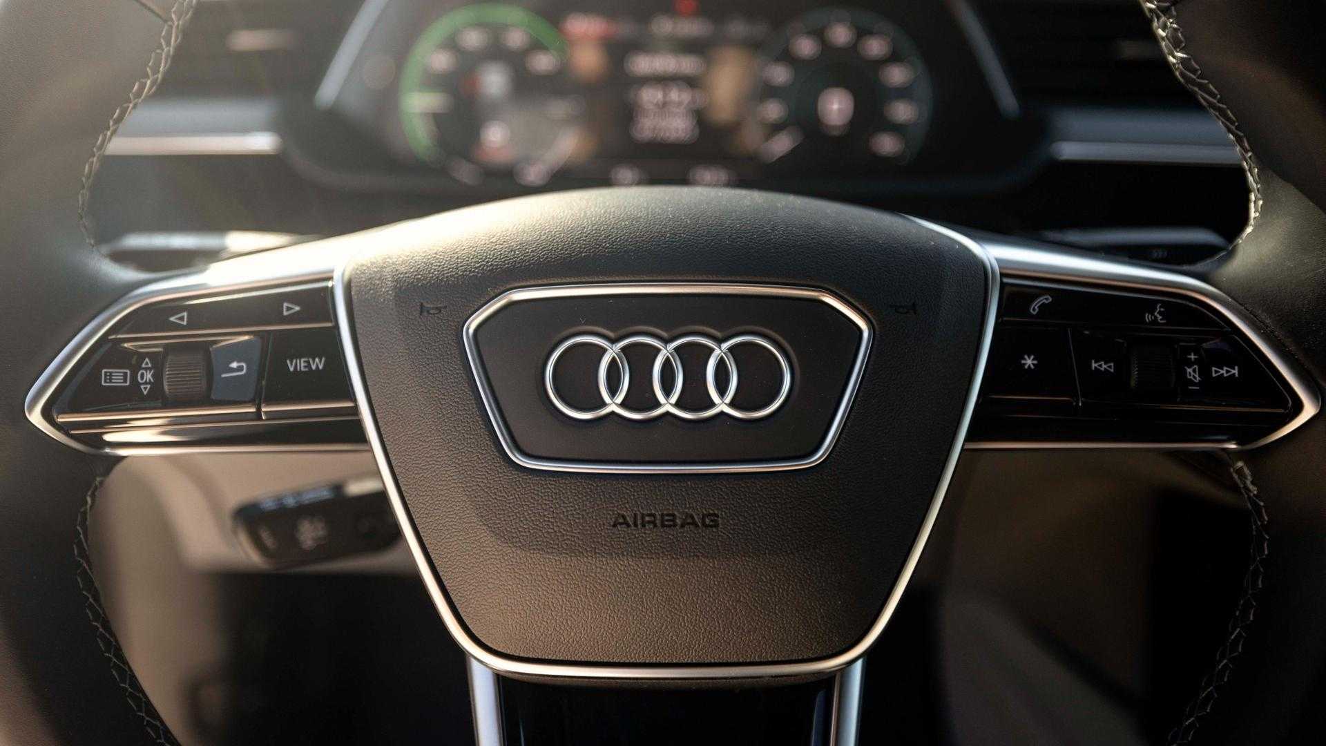 Interior view of an Audi vehicle steering wheel.