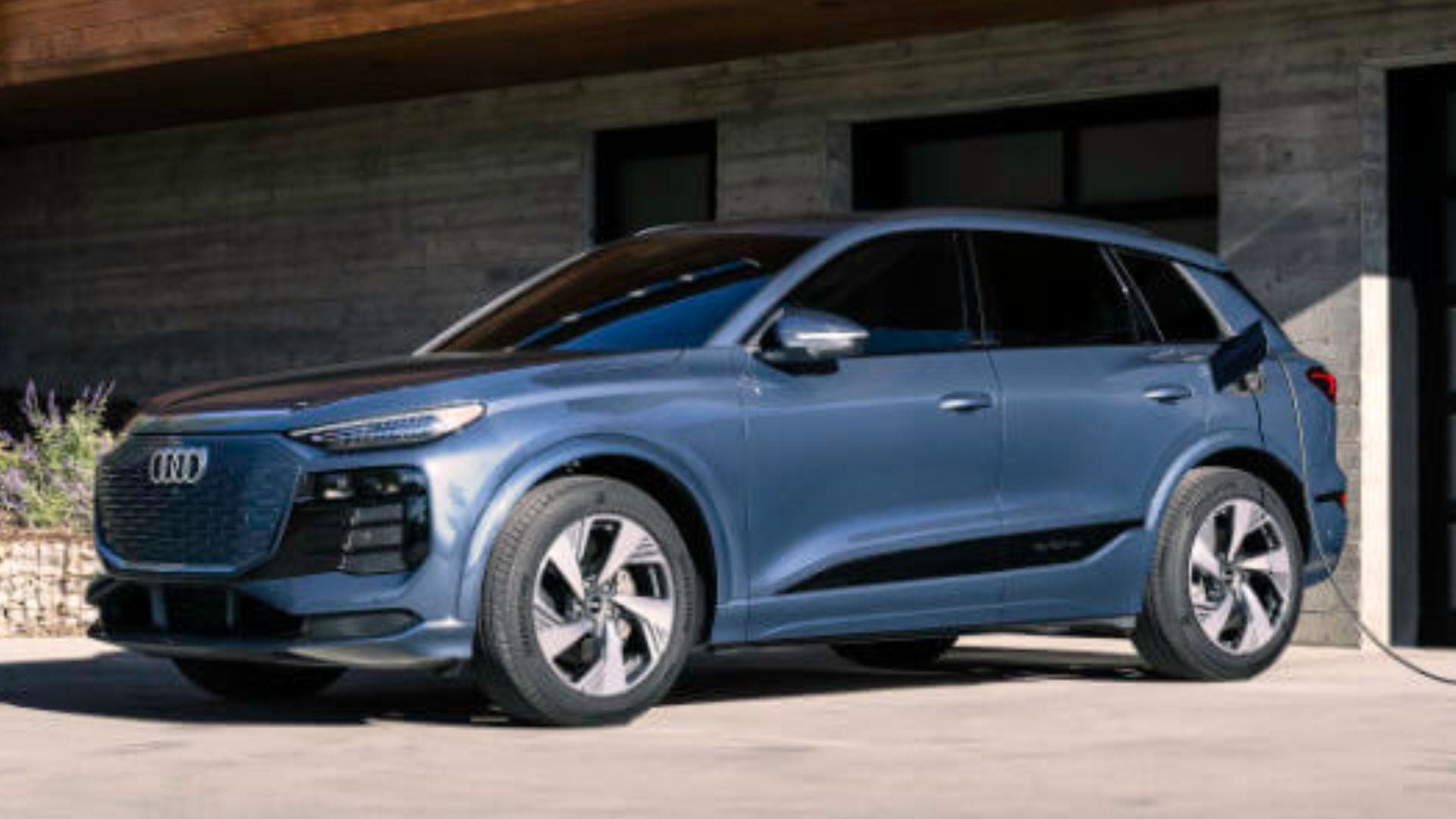 2025 Audi Q6 e-tron Exterior Charging In Driveway