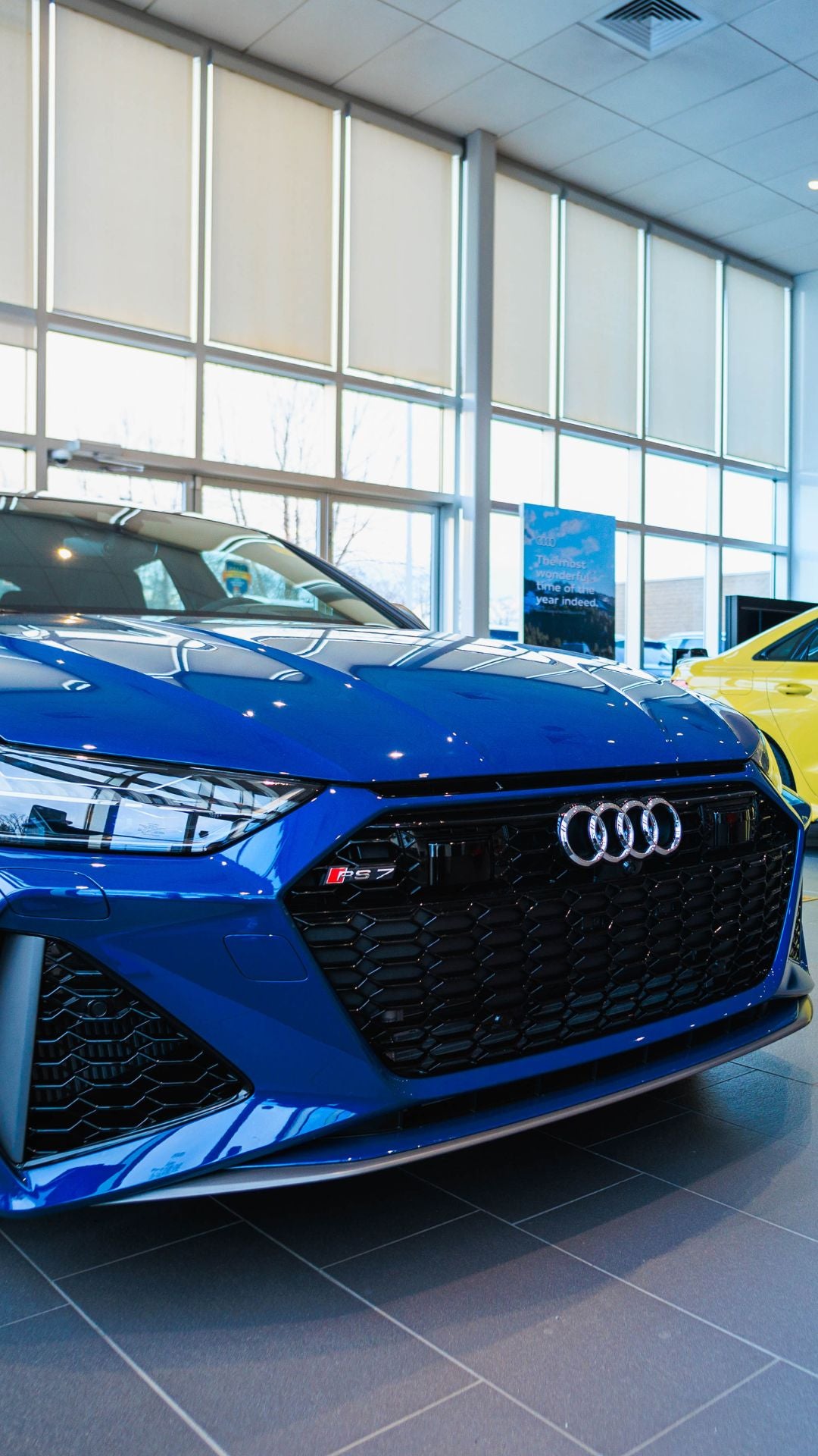 Rear profile view of an Audi Q5 parked.