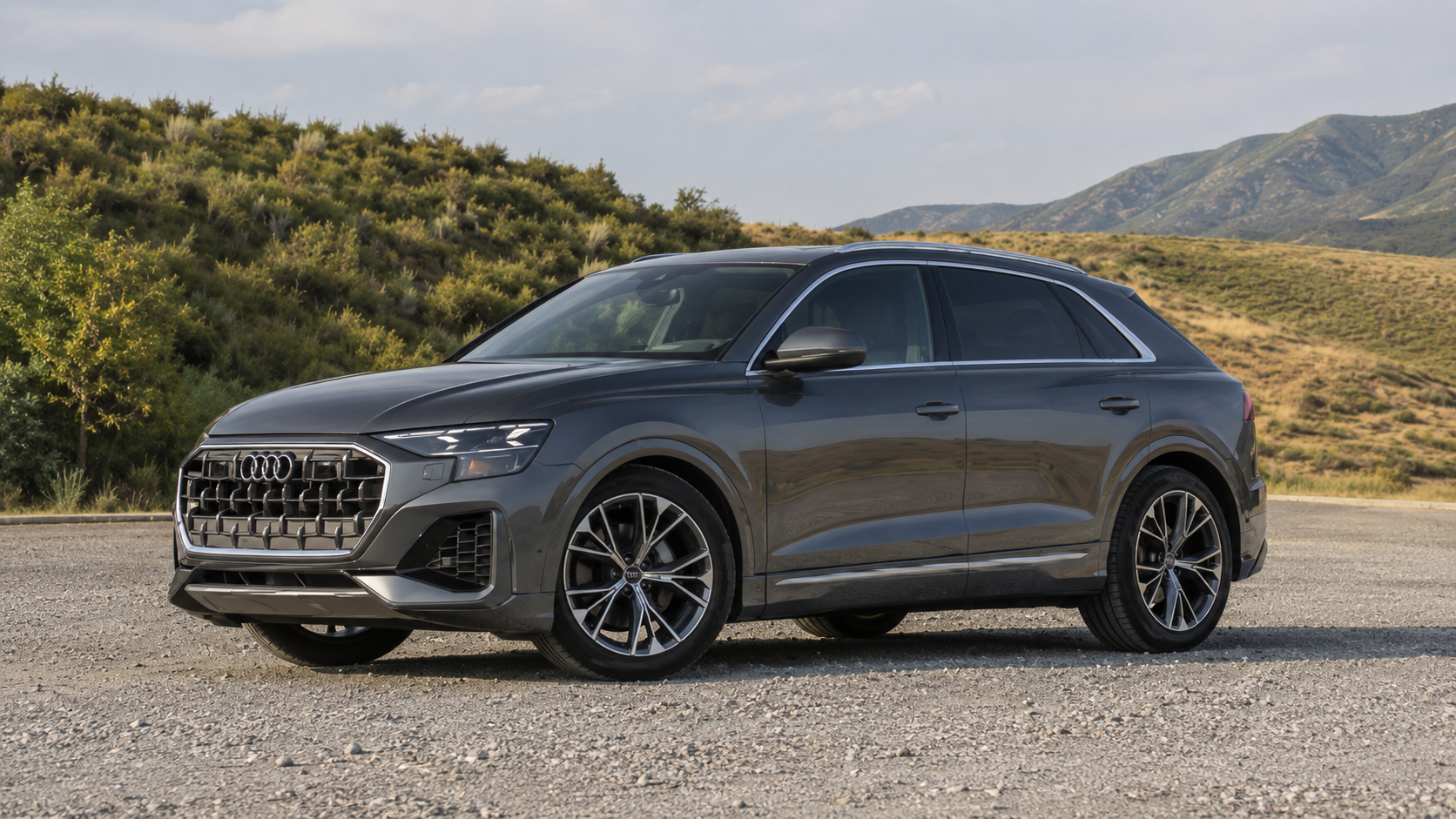 Side profile of a 2026 Audi Q8 compact SUV parked outdoors