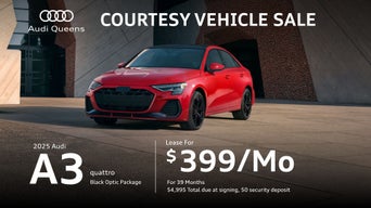 Three quarter view of an Audi A3 parked.