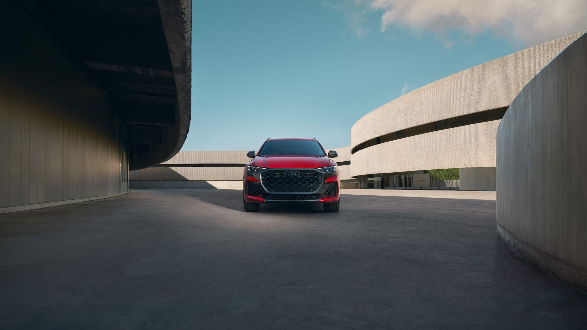 Front profile view of an Audi RSQ8 parked.