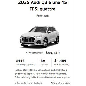 Side view of an Audi Q3 driving.