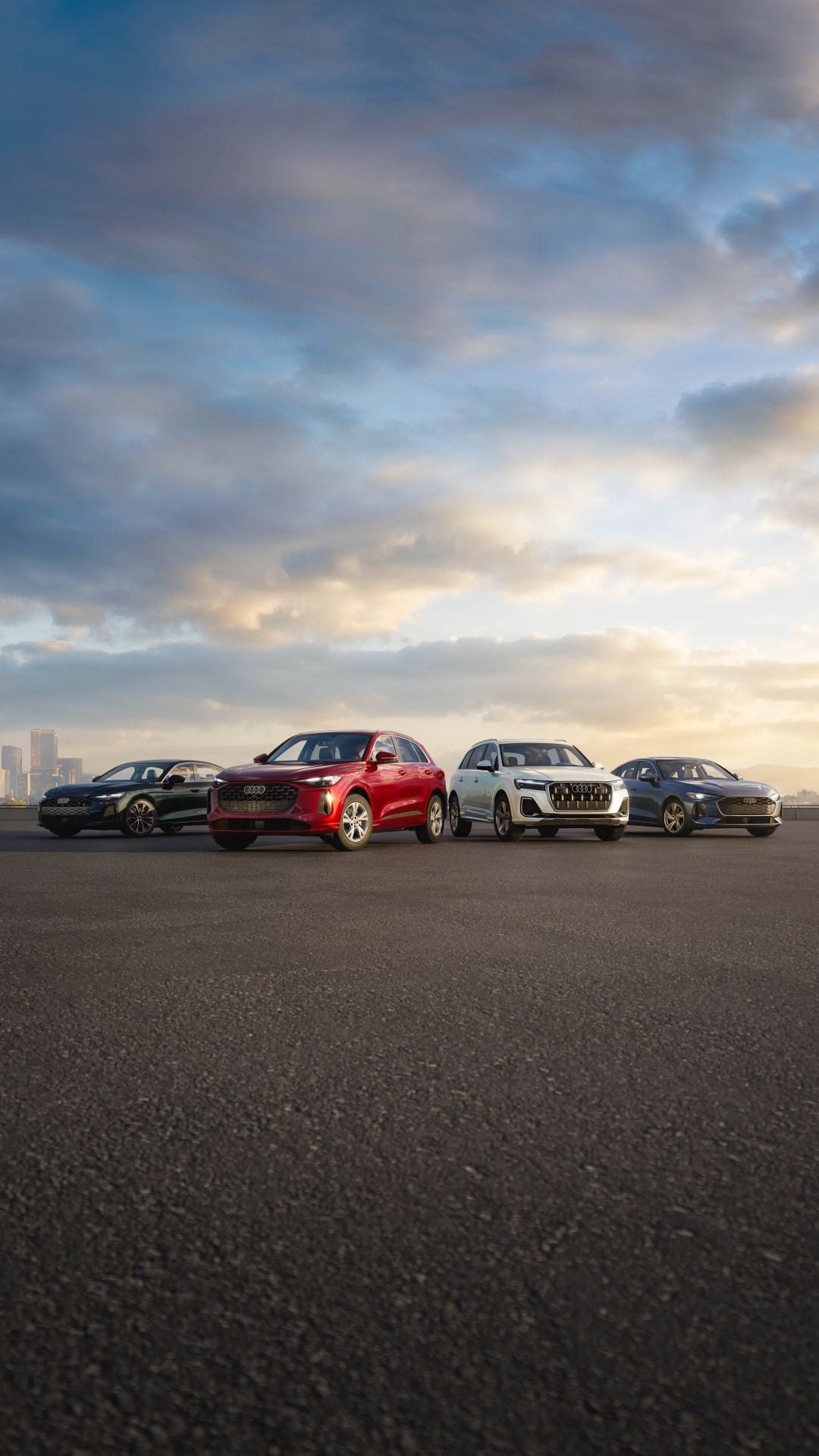 Audi vehicles parked in a lineup.