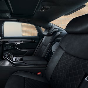 Interior view of the back seats in the Audi S8.