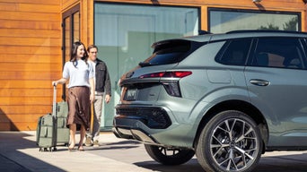 Rear view of a 2026 Audi Q3 on the road