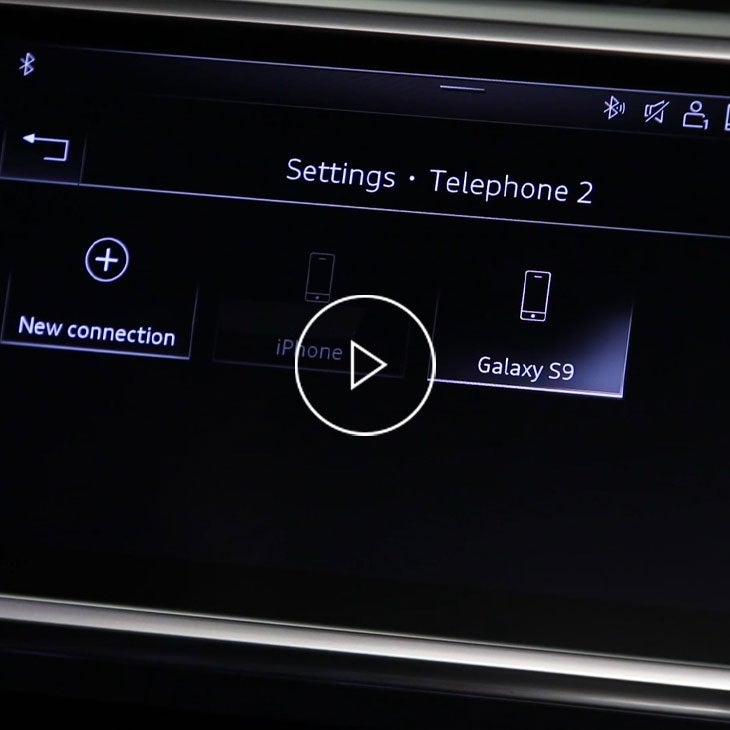  Close-up photo of the MMI screen in an Audi displaying the Bluetooth options.