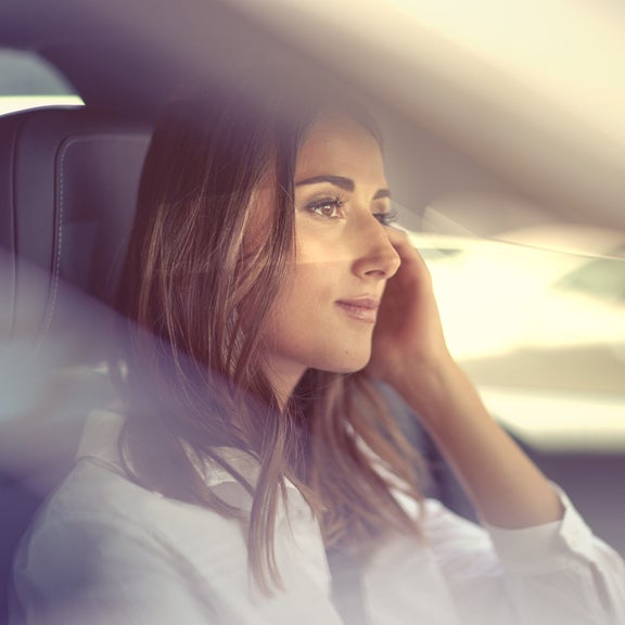 Audi Select customer driving in a purchased Audi car.