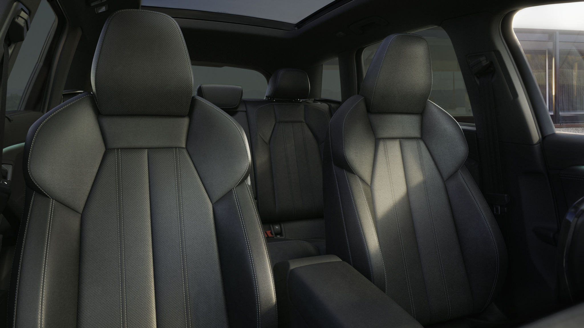 Inside of a Q6 e-tron showing the front row seats.