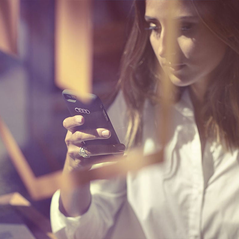 Audi Customer using a mobile phone