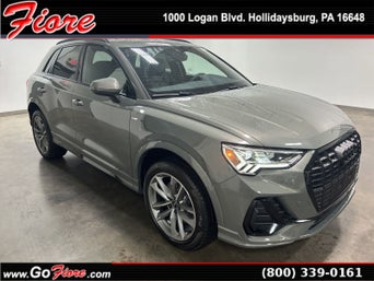 Side profile view of an Audi Q3. 