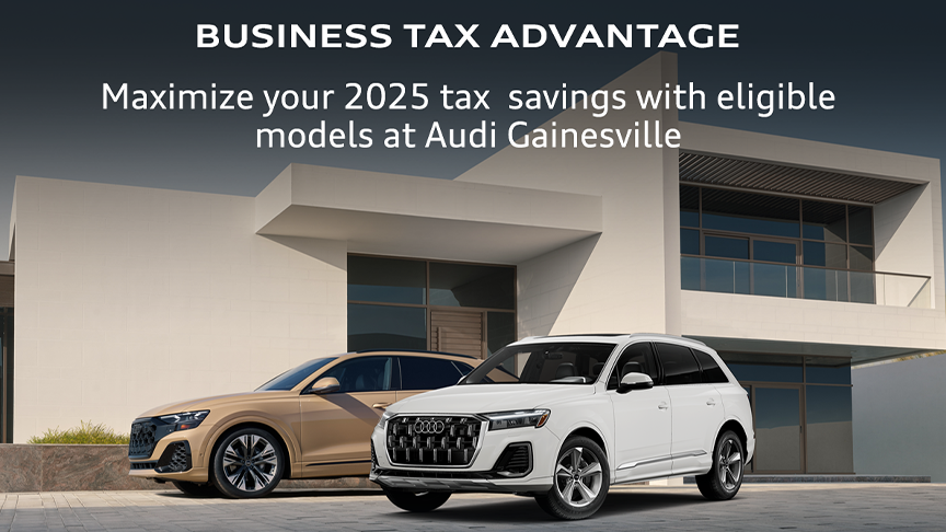 Image of two Audi's stating there are business tax advantages available