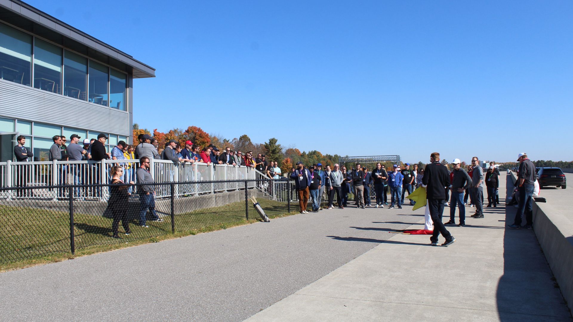 Audi Sale Specialist explaining vehicle features to a customer.