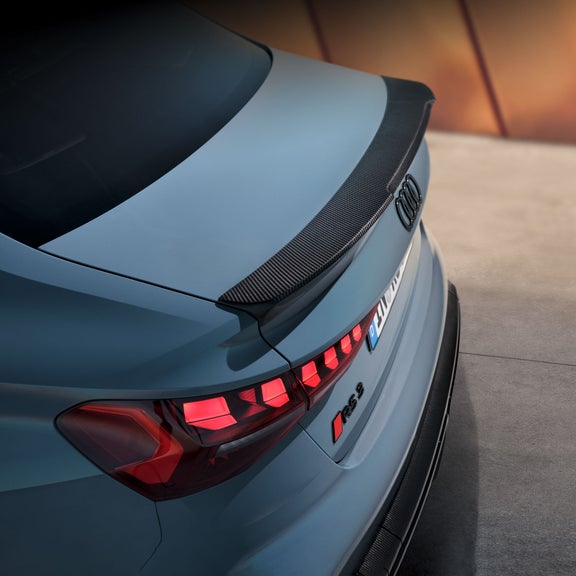 Side view of the Audi RS 3 parked.