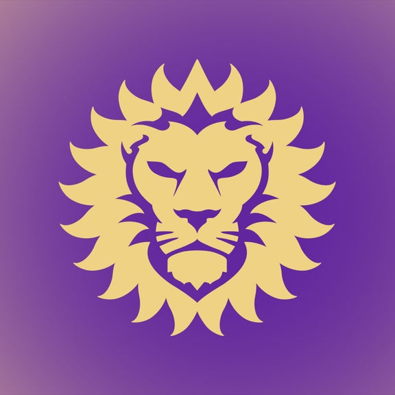 The aurora borealis in the sky shown against a background of snow-capped mountains.  