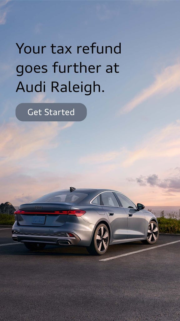 Back view of an Audi driving.