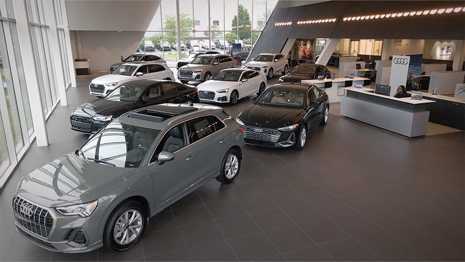 Left profile view of an Audi q8 vehicle parked.