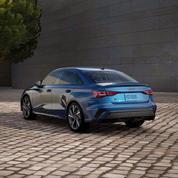 Rear 3/4 view of the Audi S3 in parked.